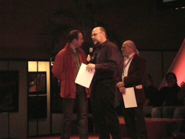 Utopiales 2007. Robert Charles Wilson, entre François Angelier, producteur de l'émission Mauvais Genre, et Jean-Pierre Fontana